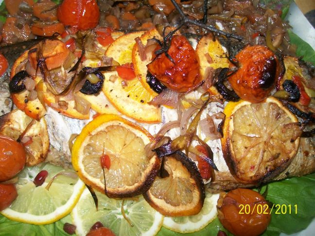 Dorada  umpluta  pe pat de legume