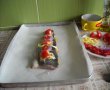 Pastrav la cuptor, pe pat de portocala, lamaie si limeta-10